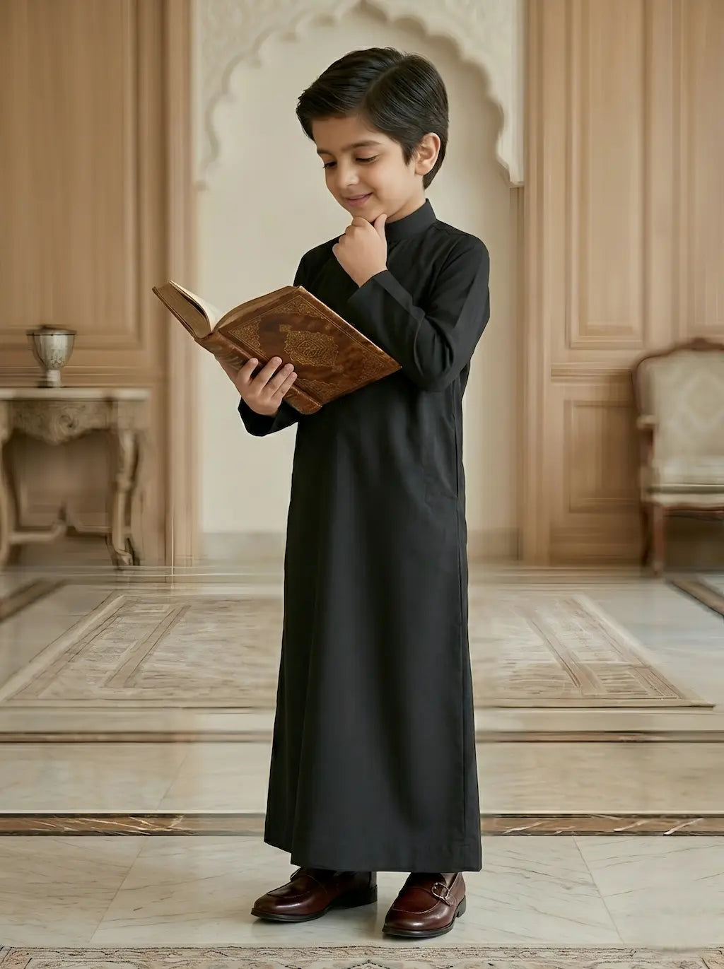 Child in a black outfit reading a book in an elegant room with wooden furniture.