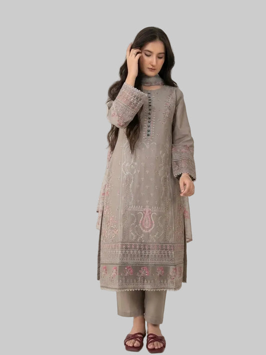 Woman wearing a dusty brown embroidered kurta with pants on a white background