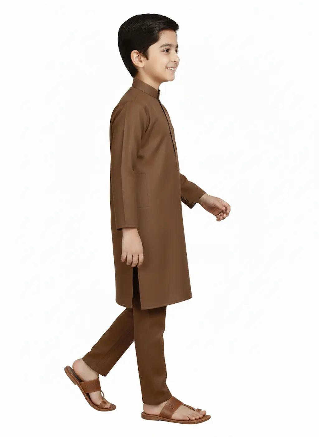 Child wearing a brown kurta with pants on a white background