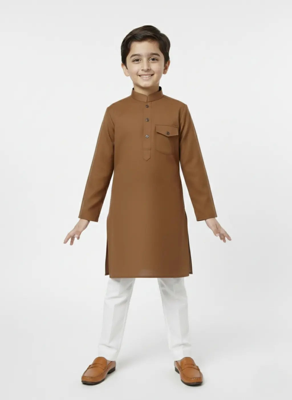 Child wearing a brown kurta with white pants on a white background