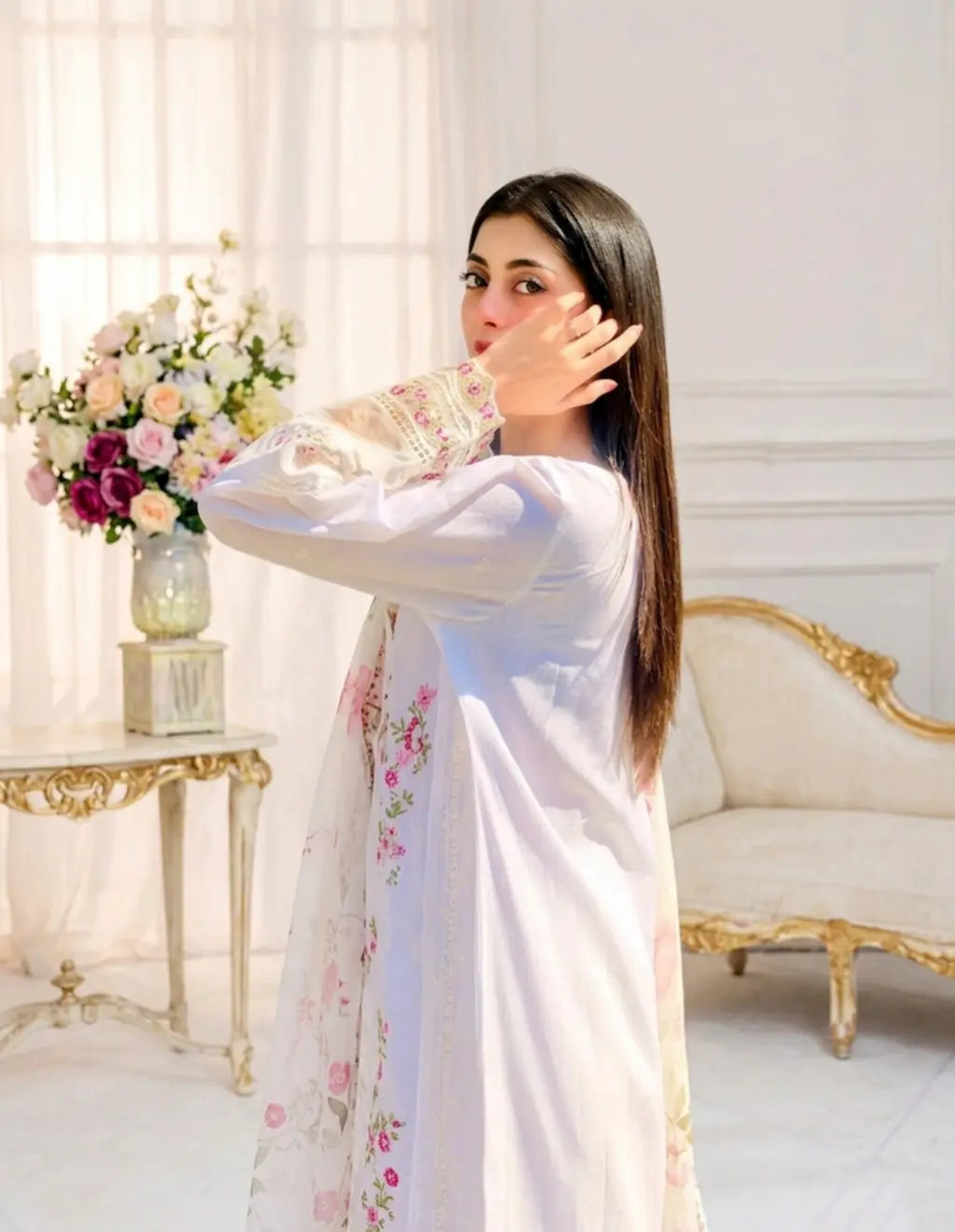 Close-up of a premium white 3-piece embroidered cotton lawn suit for women. The design highlights intricate pink floral embroidery on the back and delicate organza lace detailing on the sleeves. A stylish and breathable summer ensemble from the Opal collection, perfect for semi-formal wear.